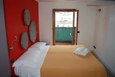 Letto o letti in una camera di Hotel San Geremia