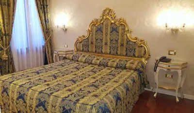 Letto o letti in una camera di Casa Pisani Canal