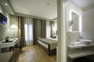 Letto o letti in una camera di Hotel Forte del 48