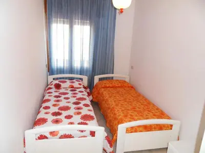 Letto o letti in una camera di Settimo cielo