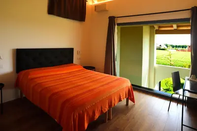 Letto o letti in una camera di B&B Ca' del Portego