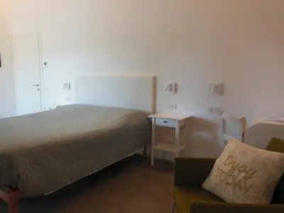 Letto o letti in una camera di B&B Ca' del Portego