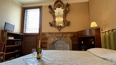Letto o letti in una camera di Residence Grand Canal Panorama