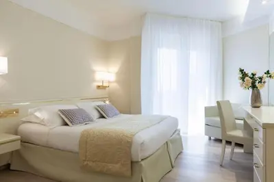 Letto o letti in una camera di Hotel Bristol