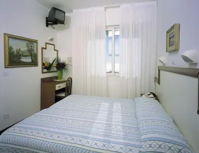 Letto o letti in una camera di Hotel Bolivar