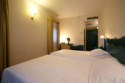 Letto o letti in una camera di Hotel Antico Mulino