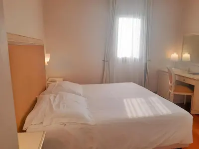 Letto o letti in una camera di Hotel Antico Mulino