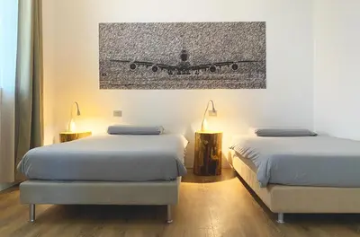 Letto o letti in una camera di Villa Sabbioni