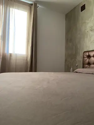 Letto o letti in una camera di Villa Sabbioni