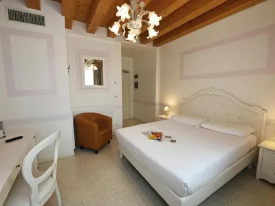 Letto o letti in una camera di Hotel Villa Patriarca