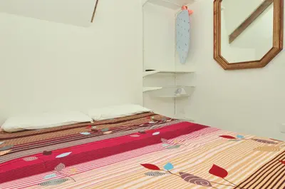 Letto o letti in una camera di COZY APARTMENT NEAR RIALTO BRIDGE/ ST.MARK SQUARE