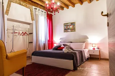 Letto o letti in una camera di Sole e Vento