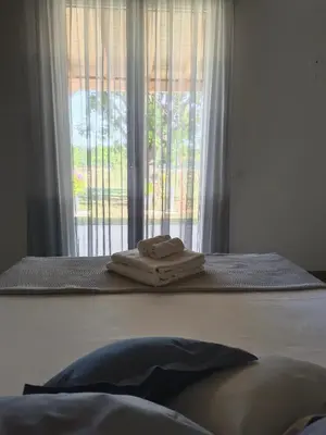 Letto o letti in una camera di La Quercia