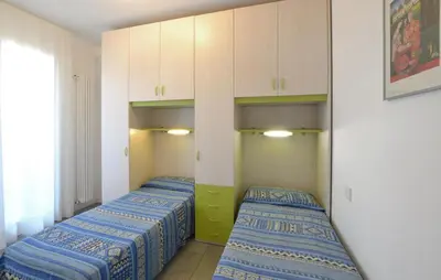 Letto o letti in una camera di Cozy Apartment In Cavallino-Treporti
