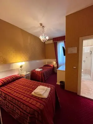 Letto o letti in una camera di Hotel Castello