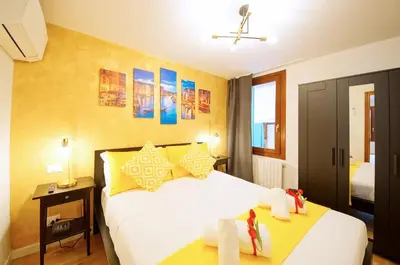 Letto o letti in una camera di DolceVita Apartments N 500 San Marco