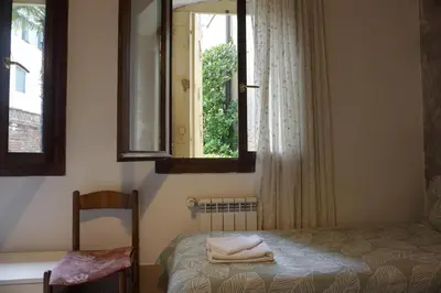 Letto o letti in una camera di CANAL VIEW