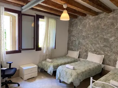 Letto o letti in una camera di CANAL VIEW
