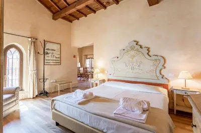 Letto o letti in una camera di Molino Stucky Residence Suites
