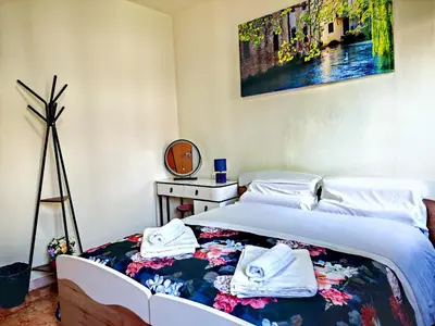 Letto o letti in una camera di Goldmine Guest House 2