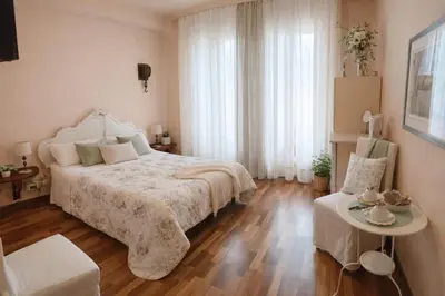 Letto o letti in una camera di Il Veliero Romantico