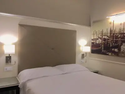 Letto o letti in una camera di San Lio Tourist House
