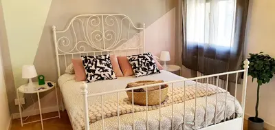 Letto o letti in una camera di Takate Collection