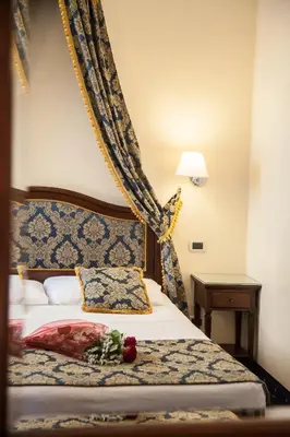 Letto o letti in una camera di Residenza Rivo Alto