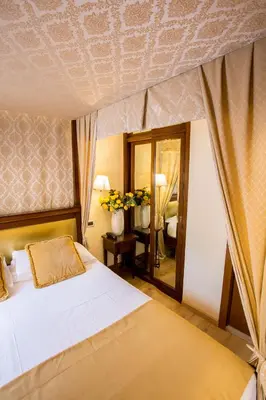 Letto o letti in una camera di Residenza Rivo Alto