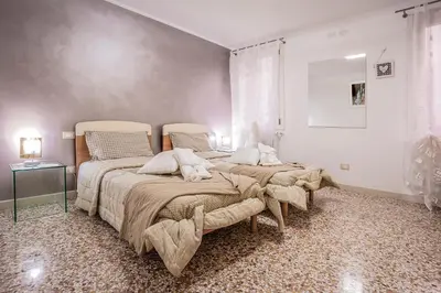 Letto o letti in una camera di Venice Dream House