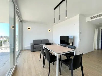 TV o dispositivi per l'intrattenimento presso BLU HOMES - Carraro Immobiliare - Family Apartments