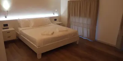 Letto o letti in una camera di Agriturismo Le Valli