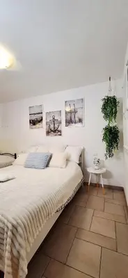 Letto o letti in una camera di Appartamento Perla Marina