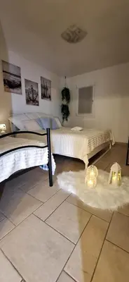 Letto o letti in una camera di Appartamento Perla Marina