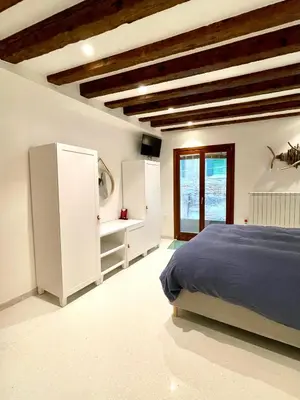 Letto o letti in una camera di Ca' dell'Ombra Felice - canal view