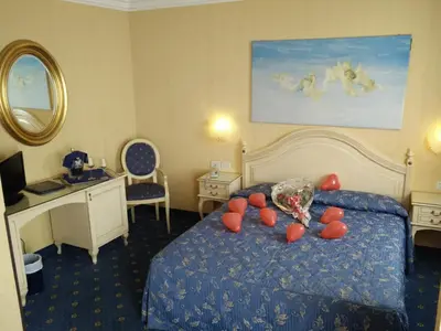 Letto o letti in una camera di Hotel Ca' Formenta