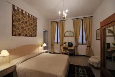 Letto o letti in una camera di Ca' Turelli Dimora Storica