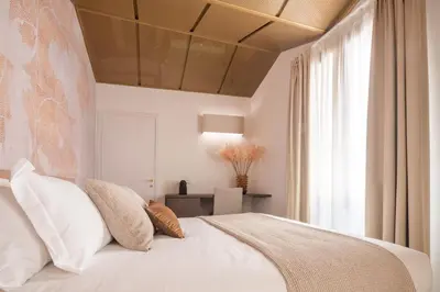 Letto o letti in una camera di Ninfea Luxury Suites