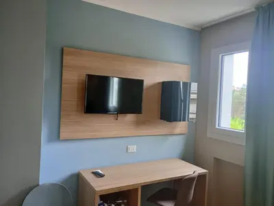 TV o dispositivi per l'intrattenimento presso Wyndham Garden Conegliano