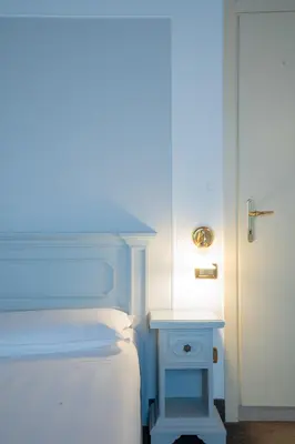 Letto o letti in una camera di Alla Corte Rossa