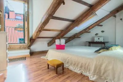 Letto o letti in una camera di Residenza de l'Osmarin Suites