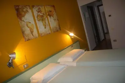 Letto o letti in una camera di Hotel Valbrenta