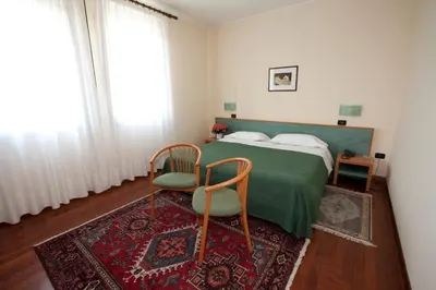 Letto o letti in una camera di Hotel Valbrenta
