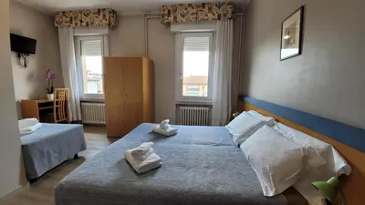Letto o letti in una camera di Hotel Montepiana