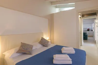 Letto o letti in una camera di CorteLuna incantevole a 500 metri da p.zza S.Marco