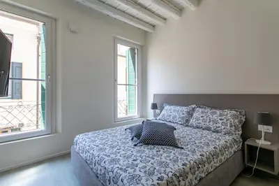 Letto o letti in una camera di Residenza SubitoSanto - Appartamento 4B 
