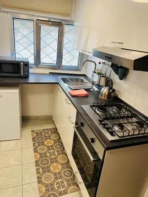 Cucina o angolo cottura di Venezia, 700mt to station, free parking, Shuttle Airport, Train Station, Via Napoli 71