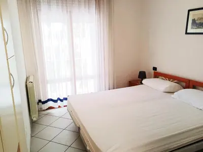 Letto o letti in una camera di Fides Apartment