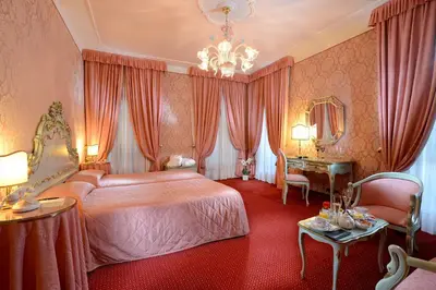 Letto o letti in una camera di Hotel Rialto