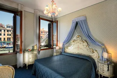 Letto o letti in una camera di Hotel Rialto